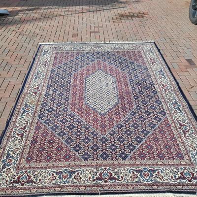 2 Persian styled rugs 1 large 1 smaller