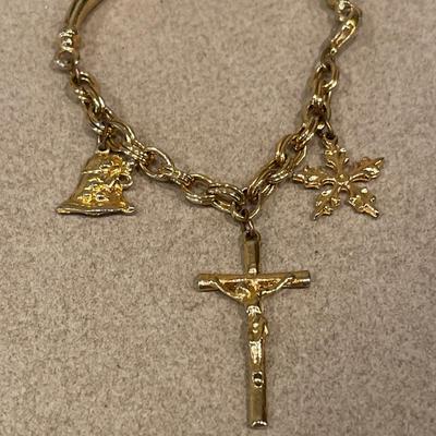 Cross bracelet and gold tone jewelry