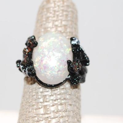 Size 7 Â¼ Silver Plated .925 Flowered Black Band with Oval Fire Opal (7.2g)