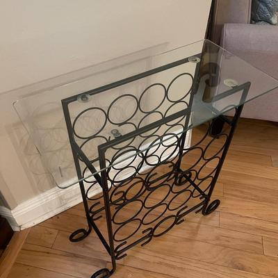 Wine Bar / table - wrought iron with tempered glass top. 26”H, 23”W, 11”D. Lots of spaces for wine.