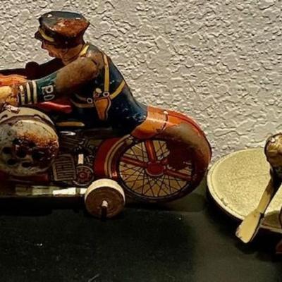 Two Antique Tin Toys