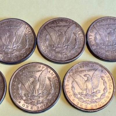 Nine Morgan Silver Dollars Dated 1880-1897