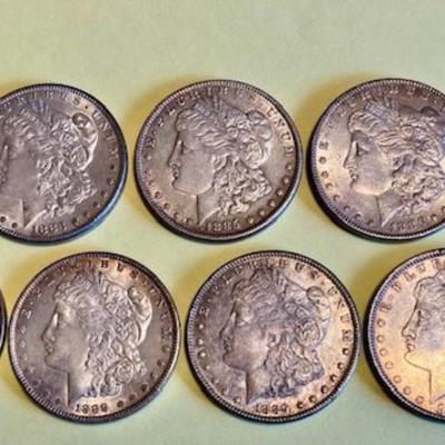 Nine Morgan Silver Dollars Dated 1880-1897