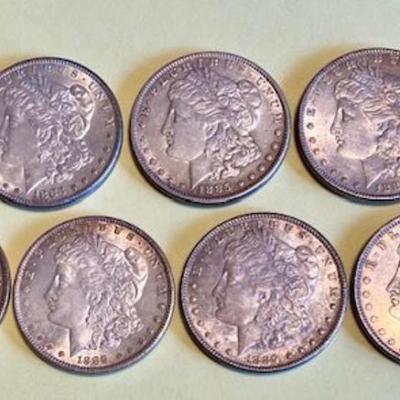Nine Morgan Silver Dollars Dated 1880-1897