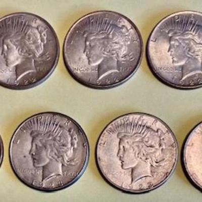 Nine Peace Silver Dollars Dated 1922-1923