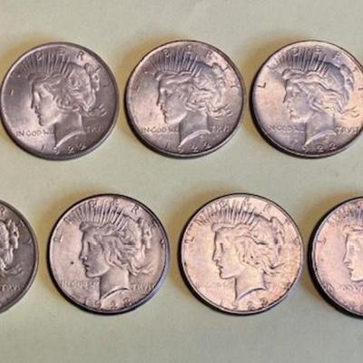 Nine Peace Silver Dollars Dated 1922-1923