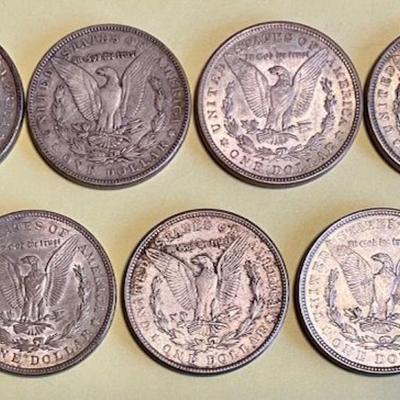 Seven Morgan Silver Dollars Dated 1900-1921