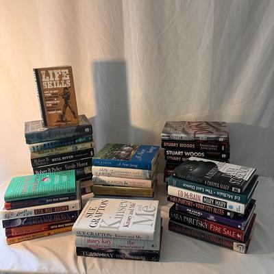 Collection of Books by Stuart Woods, Jan Karon, and more (D-DZ)