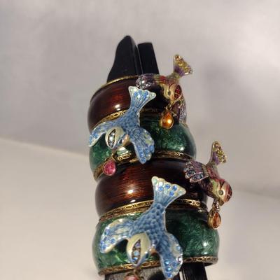 Set of Four Jay Strongwater Enamel Bird Adorned Napkin Rings