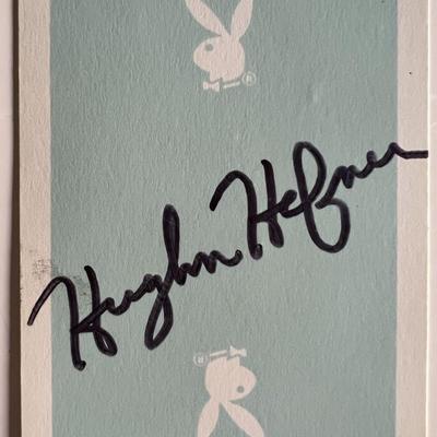 Hugh Hefner signed playing card. GFA authenticated.