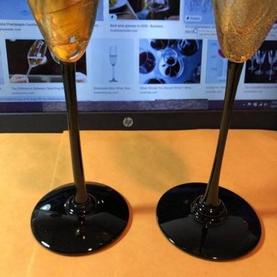 2-(RANDY STRONG) HAND SIGNED CHAMPAGNE GLASSES 10" TALL PREOWNED FROM AN ESTATE IN VG CONDITION AS PICTURED.
