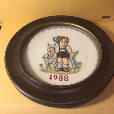 7 Different Hummel Collector Plates Mounted in a Wooden Frames Preowned as Pictured.