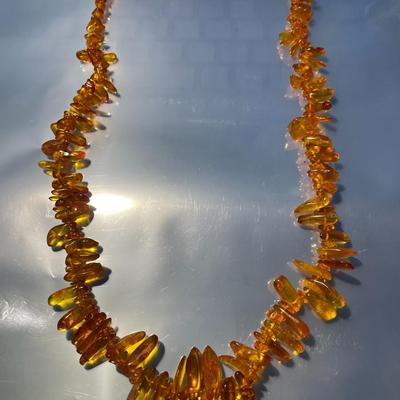 Vintage Baltic Honey Amber Graduated Polished Chip Bead Necklace 24" Long No Clasp Slip-on in VG Preowned Condition.