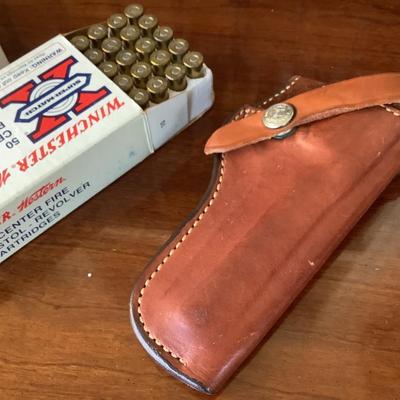 .38 ammo and leather gun holder