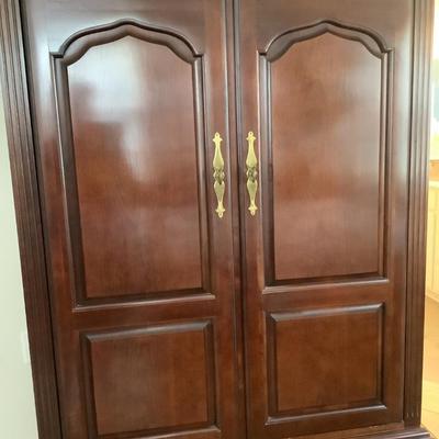 Thomasville chest/ TV cabinet 3 drawer, doors that fold in, 68â€H 40â€W 23â€depth