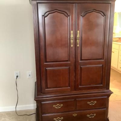 Thomasville chest/ TV cabinet 3 drawer, doors that fold in, 68â€H 40â€W 23â€depth