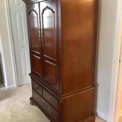 Thomasville chest/ TV cabinet 3 drawer, doors that fold in, 68â€H 40â€W 23â€depth