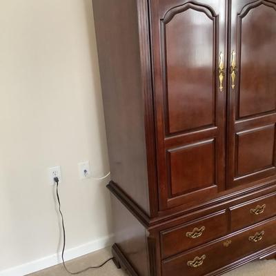 Thomasville chest/ TV cabinet 3 drawer, doors that fold in, 68â€H 40â€W 23â€depth