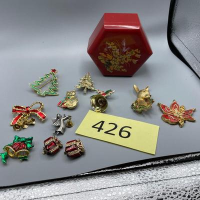 Lot of Christmas pins in box