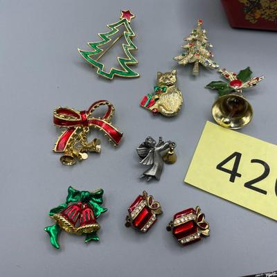 Lot of Christmas pins in box