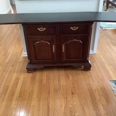 Thomasville bar cabinet on casters 33â€H 40â€W 18â€depth - 80â€W when open