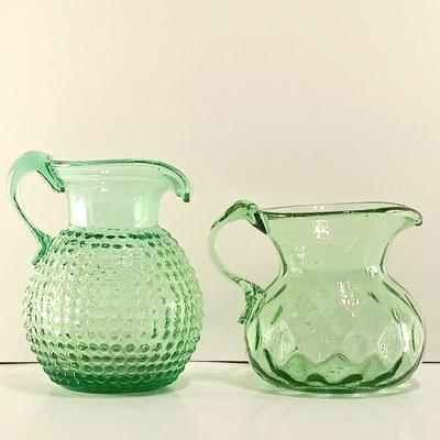 LOT 2: A Collection of Light Green Glass Pitchers