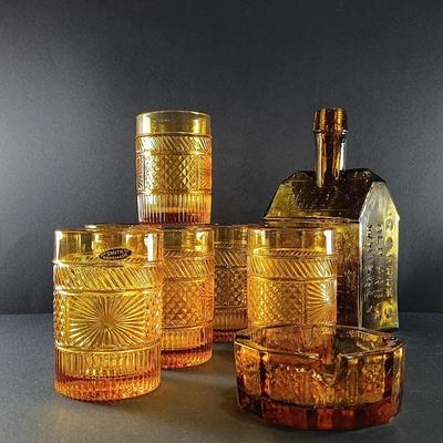 LOT 17: Set of 6 Smith Amber Glass Tumblers with an E.G. Booz's Old Cabin Whiskey Bottle and Ashtray