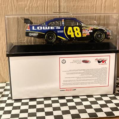 LOT 56: Four NASCAR Jimmy Johnson #48 Collector Die-Cast Cars (1:24 Scale)