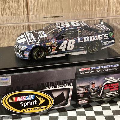 LOT 56: Four NASCAR Jimmy Johnson #48 Collector Die-Cast Cars (1:24 Scale)
