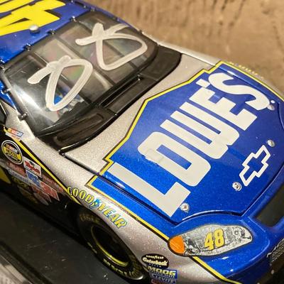 LOT 61: Thomas Kinkade NASCAR Wall Hanging with Jimmy Johnson #48 Collectible Die-Cast Race Cars and More