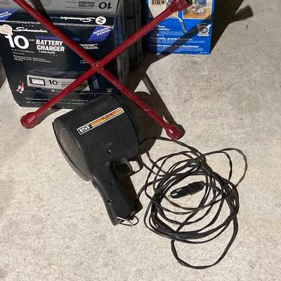 LOT 65: Automobile Lot - Battery Charger, Booster Cables, Nite-Tracker Spot Light, Portable Vacuums and More