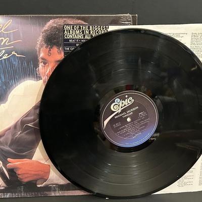 LOT 97DR: Vintage Michael Jackson Collection Including 80' Doll & Thriller Record