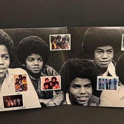 LOT 97DR: Vintage Michael Jackson Collection Including 80' Doll & Thriller Record