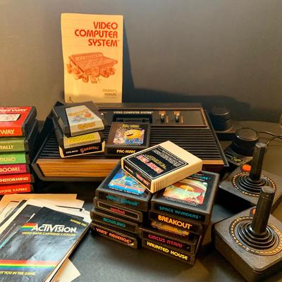 LOT:109: Vintage Video Games Atari Computer System, Video Game Cartridges and Booklets from Atri and Coleco Actrivision