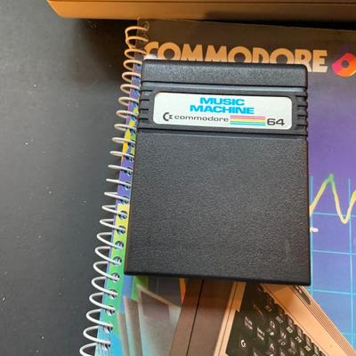 LOT:110: Comodore 64 Computer with Programing and Users Guides, Music Machine Program Cartridge with Original Boxes and Power Cord