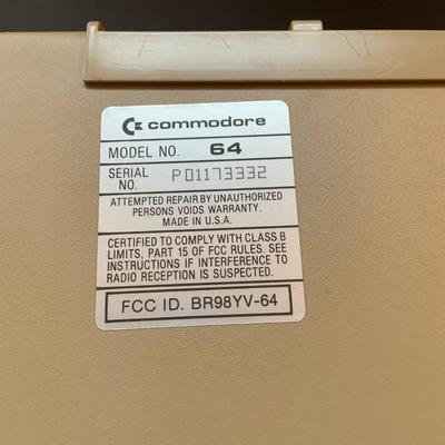 LOT:110: Comodore 64 Computer with Programing and Users Guides, Music Machine Program Cartridge with Original Boxes and Power Cord