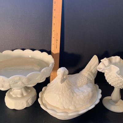 LOT:116: Vintage Milk Glass Collection Featuring a Fenton Hen on a Nest, Hobnail Compote Candy Dish, also a Shoe and Cake Plate