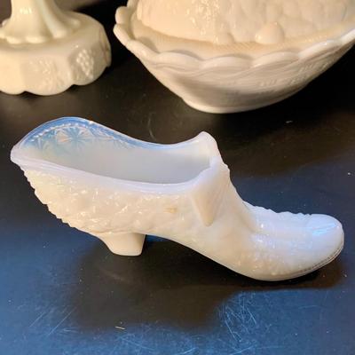 LOT:116: Vintage Milk Glass Collection Featuring a Fenton Hen on a Nest, Hobnail Compote Candy Dish, also a Shoe and Cake Plate