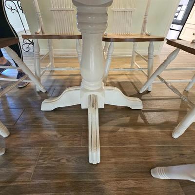White wooden table and chairs
