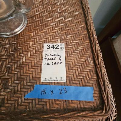 Wicker table and oil lamp