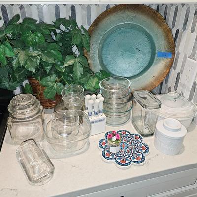 Blue plate, greenery and glass