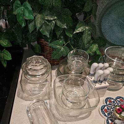 Blue plate, greenery and glass