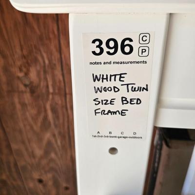 White wooden twin bed frame