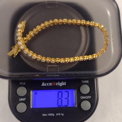 14K and Cubic Zirconia Tennis Bracelet 8 (gram total weight) (#20)