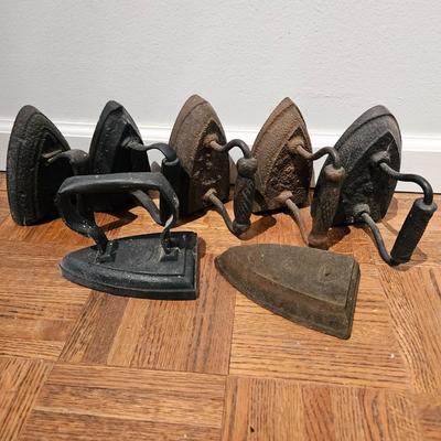 Seven Antique Sadirons (LR-DW)
