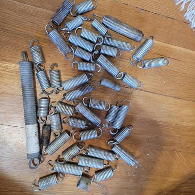 Lot of assorted springs in a basket