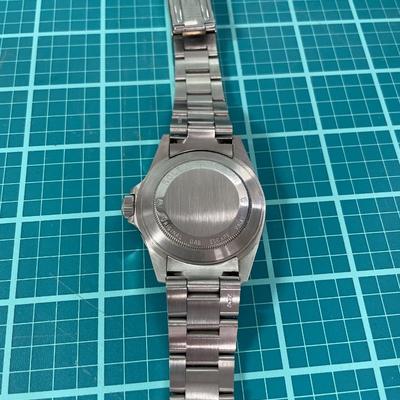 Rolex (possibly)