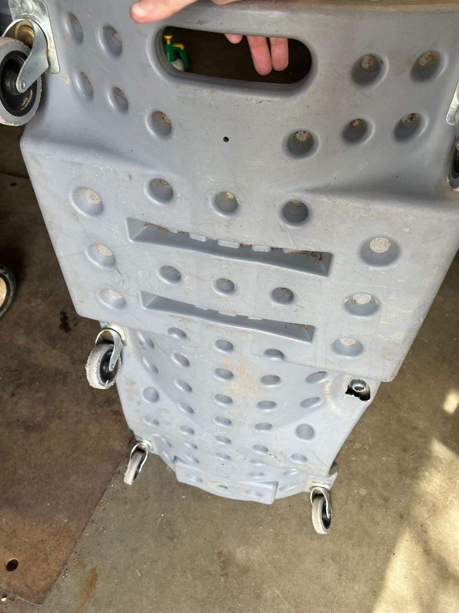 Garage creeper under car roller