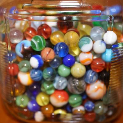 JAR FILLED WITH VINTAGE MARBLES