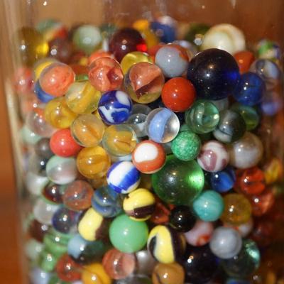 GLASS CONTAINER OF VINTAGE MARBLES UNSORTED